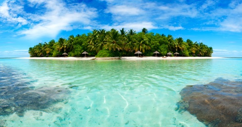Islands and other coastal area like this atoll in the Maldives could be submerged under rising sea levels in a matter of decades, say climate change observers. Photo: BigStock