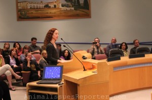 Elizabeth Oreck of Best Friends Animal Society speaks about the ordinance amidst supporters and opponents